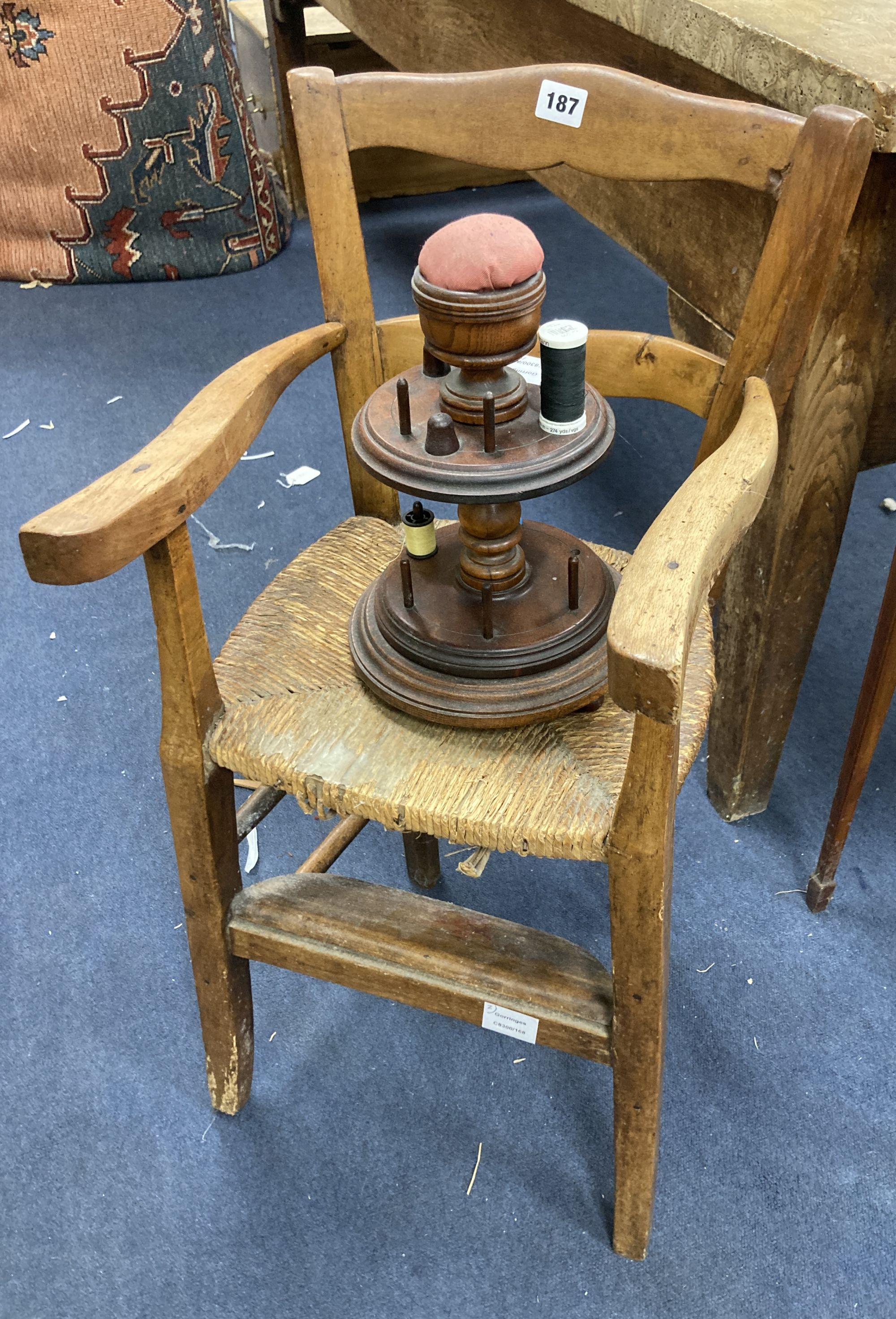 A fruitwood childs chair and a bobbin holder